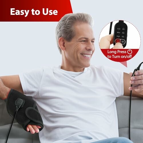 Man using a heating pad with control in hand, easy to use.